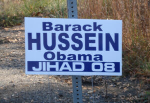 obama_racist_sign_hussein